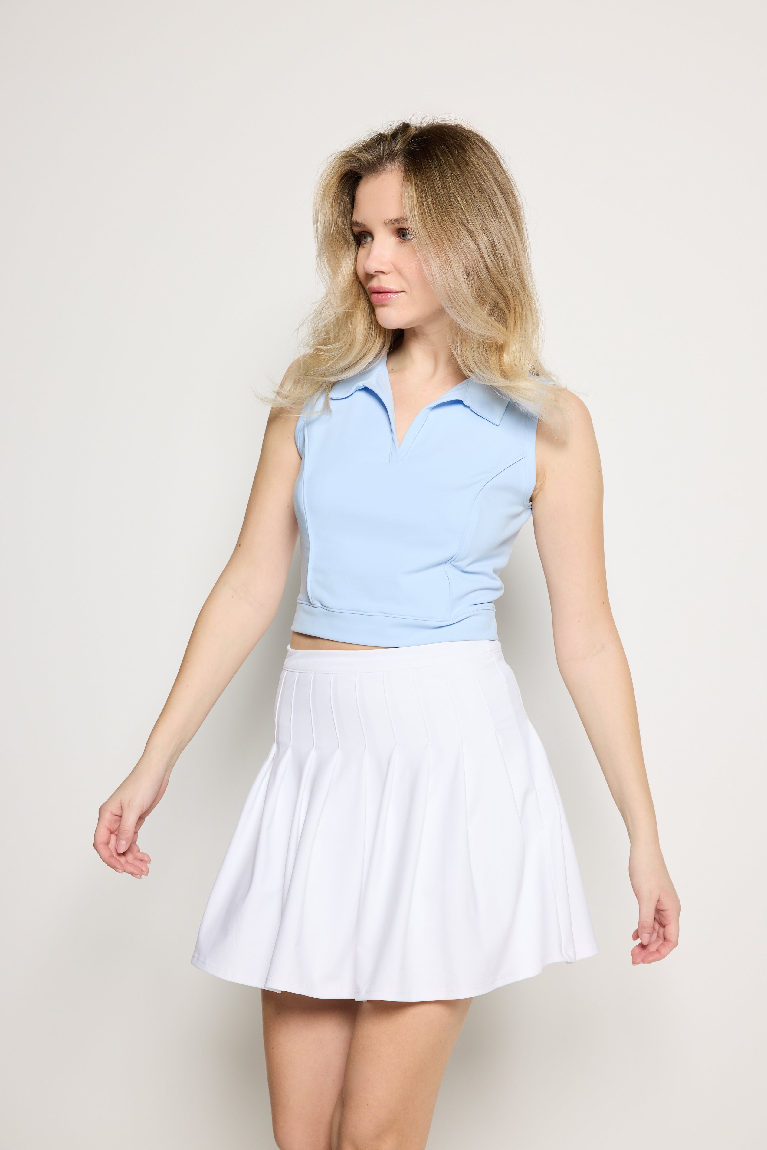 Rebecca Morgan Evie Skirt women’s pleated athletic skirt with 4-way stretch fabric for tennis and golf