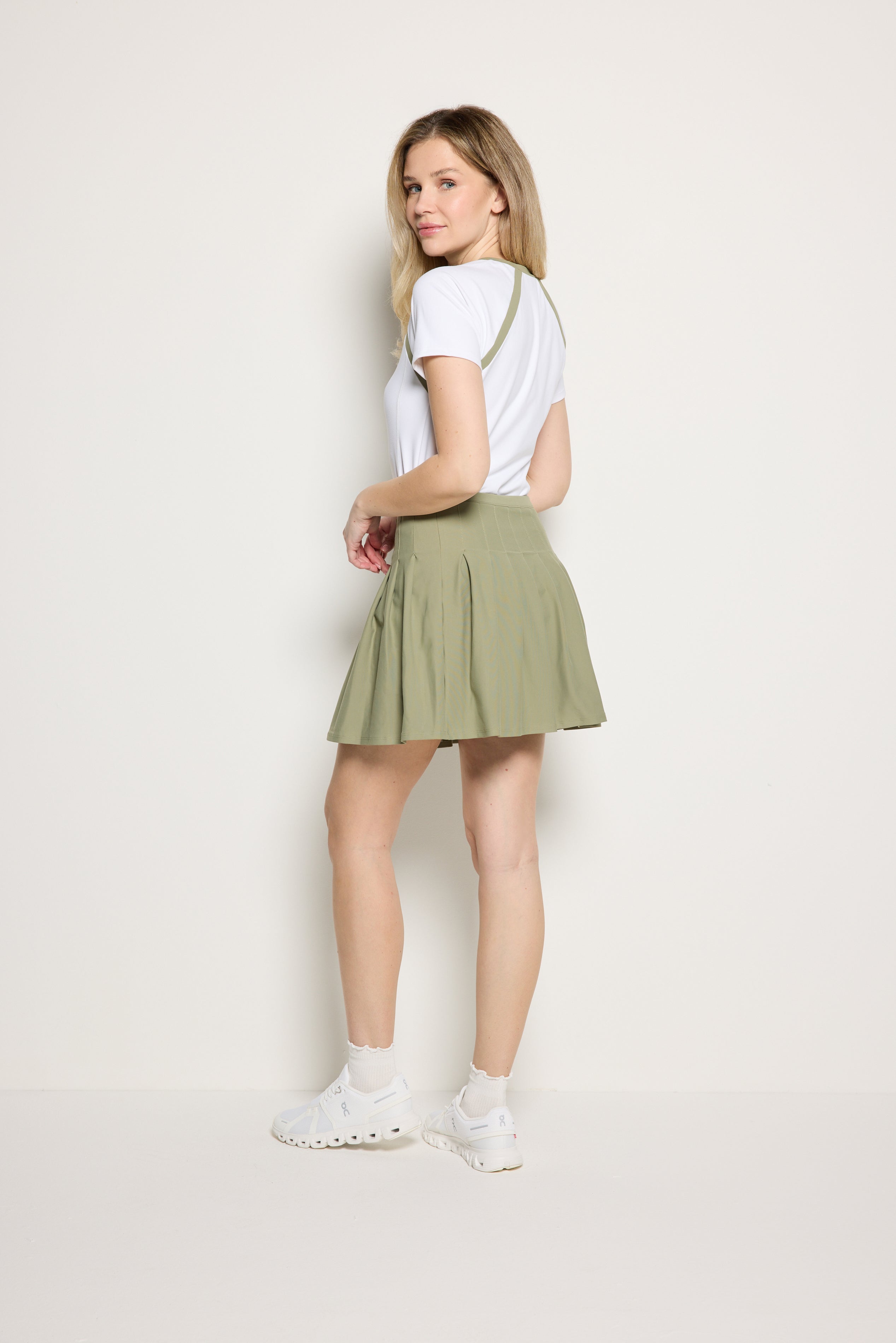 Rebecca Morgan Evie Skirt women’s pleated athletic skirt with 4-way stretch fabric for tennis and golf