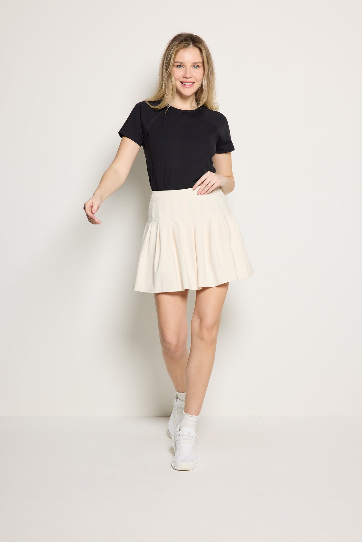 Rebecca Morgan Evie Skirt women’s pleated athletic skirt with 4-way stretch fabric for tennis and golf